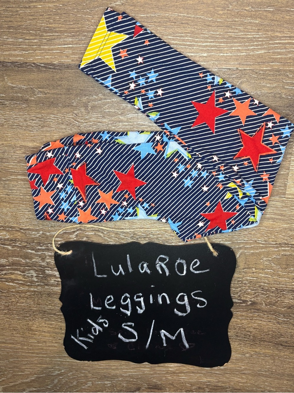 LuLaRoe Kids Navy Leggings with Red, Orange, Yellow & Light Blue Stars